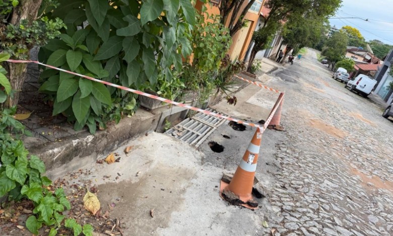 Rua Isauro Ferreira, no bairro Porto Velho, em Divinópolis, com reparos urgentes na drenagem